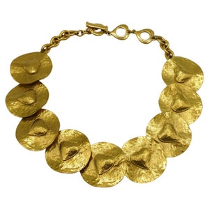 YVES SAINT LAURENT * Vintage Gold Tone Heart Disc Necklace
