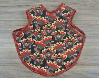 Thanksgiving Turkey Bapron = Bib + Apron. It is a Full Coverage Tie On Bib that rotects your Newborn, Baby or Toddler from big messes.