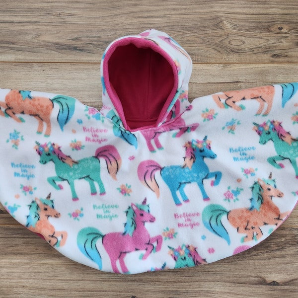 READY TO SHIP! Unicorn Car Seat Poncho fits 6 months to 6 years. It's Reversible, Hooded & Car Seat Safe to keep Kids Warm