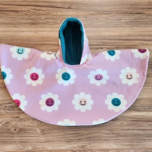 Smiley Face Car Seat Poncho fits 6 months to 6 years. It&#39;s Reversible, Hooded and Car Seat Safe to keep Kids Warm