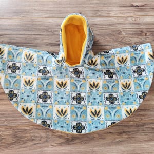 Aqua and Yellow Floral Car Seat Poncho fits 6 months to 6 years. It&#39;s Reversible, Hooded and Car Seat Safe to keep Kids Warm