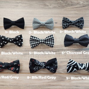 May include: Nine different bow ties displayed on a wooden surface. The bow ties are in various patterns and colors, including black, white, gray, and red. The bow ties are numbered 1 through 9.