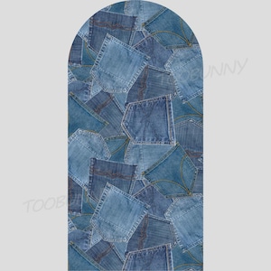 May include: A collage of denim pockets in various shades of blue, arranged in an arch shape. The pockets are sewn together, creating a textured and patchwork design. The image has a neutral background.