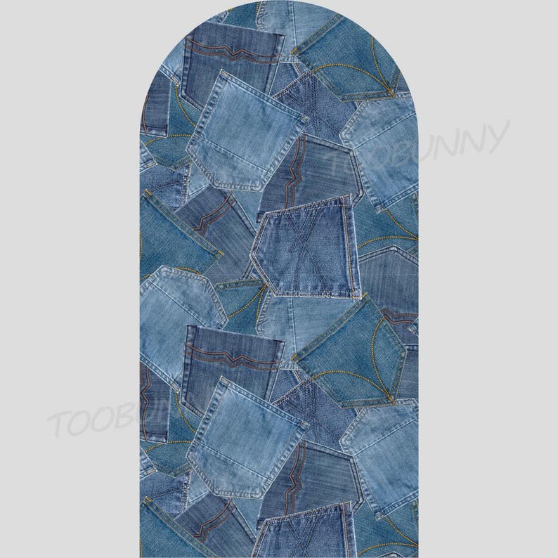 May include: A collage of denim pockets in various shades of blue, arranged in an arch shape. The pockets are sewn together, creating a textured and patchwork design. The image has a neutral background.