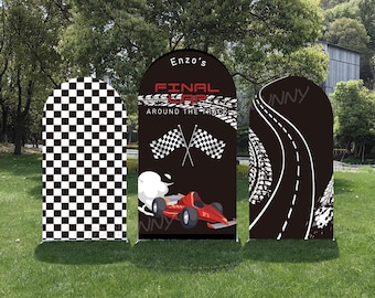 May include: Three arched banners for a racing-themed event. The left banner has a black and white checkered pattern. The center banner features a red race car, checkered flags, and text that reads "Enzo's FINAL LAP AROUND THE TRACK". The right banner has a road design.