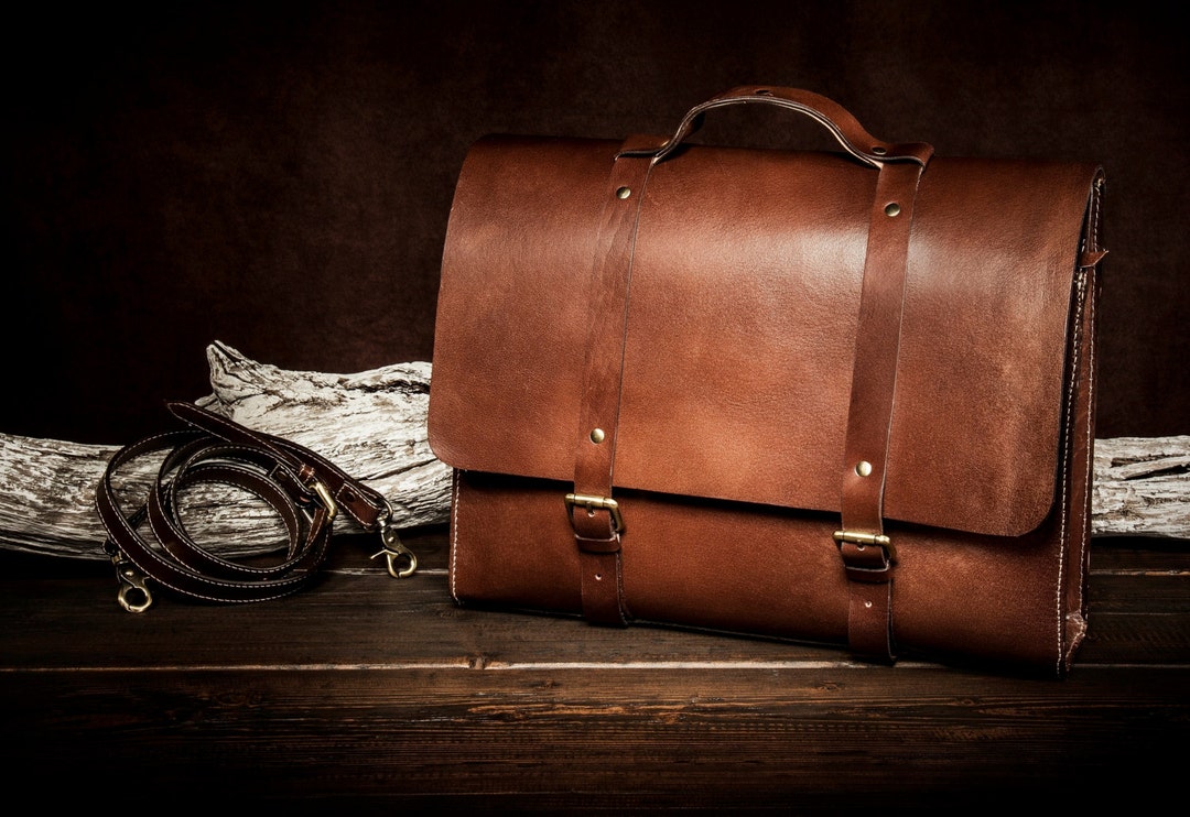 Brown leather E/W Soft Trunk Bag with logo strap