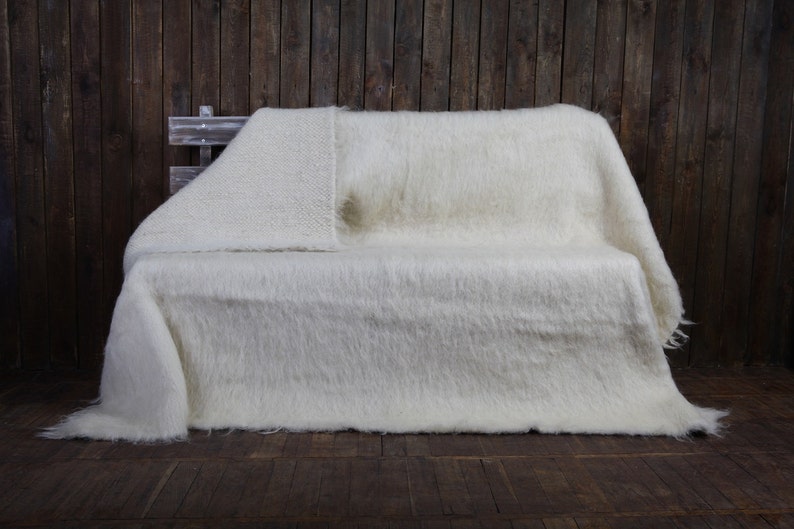 White handmade wool throw.