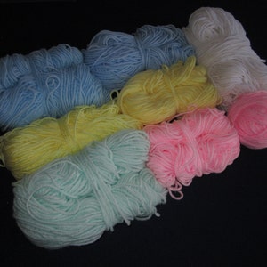 8 partial skeins of baby color yarn, light bue, baby pink, light yellow, pastel mint green, 13 oz total, worsted weight, 4 ply