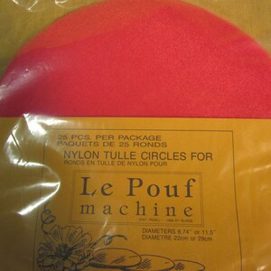 May include: A package of 25 bright red nylon tulle circles for a pouf machine. The package is labeled "Le Pouf machine" and includes the text "25 PCS. PER PACKAGE PAQUETS DE 25 RONDS NYLON TULLE CIRCLES FOR RONDS EN TULLE DE NYLON POUR" and "DIAMETERS 8.74" or 11.5" DIAMETRE 22cm or 29cm".