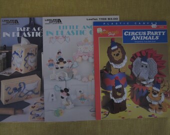 3 plastic canvas booklets,Circus Party Animals,Little Angels,Take A Gander ,lion,tiger,bear,elephant,baby nursery,ducks,tissue boxes