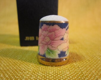 Porcelain China thimble with gold trim, pink flowers ,blue background, 3/4" x 1", Thimble collector's club, JHB Imports # 2115