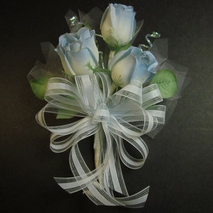 7" handmade corsage, baby blue satin roses and ribbon bow, for weddings,proms,anniversary, etc.