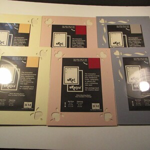 6 reversible 8x10 mats for 5x7 photos or artwork, 2 pink/burgundy, 2 cream/tan, 2 blue/gray, with heart cutouts
