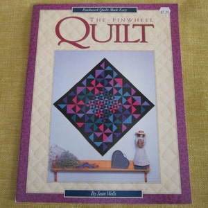 The pin wheel quilt, book by Jean Wells, pattern,projects,with easy step by step instructions. 22 pages, soft back.