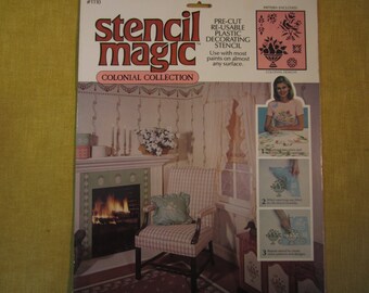 May include: Stencil Magic Colonial Collection stencil kit with a pre-cut reusable plastic stencil. The image shows a living room with a fireplace and a chair. The stencil is for decorating with most paints on almost any surface. The pattern included is Colonial Designs.