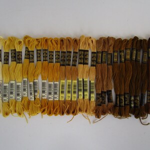 10 shades cream,yellow,gold,tan,bronze,brown,3 ea. 30 skeins, DMC cross stitch thread, 3823,3822,3821,3820,729,676,3045,831,830,869, #27
