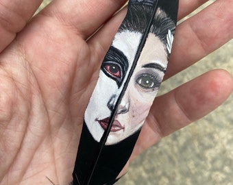 Nina from Black Swan, hand painted on a black feather