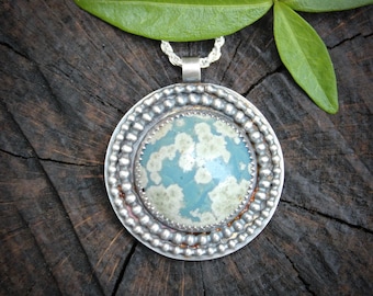 Snowflake Leland Blue pendant in round sterling silver setting
