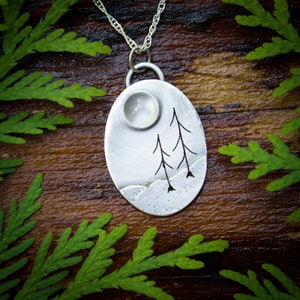 Sterling silver pendant with pine trees and moonstone moon