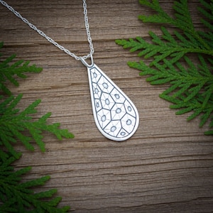 Petoskey stone pattern in sterling silver on teardrop pendant