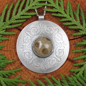 Petoskey stone medallion pendant handmade from sterling silver