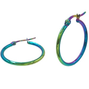 May include: A pair of rainbow iridescent hoop earrings. The earrings are made of metal and have a smooth finish.