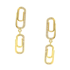 May include: Gold tone earrings with a double-linked chain design, each link is encrusted with clear cubic zirconia stones.
