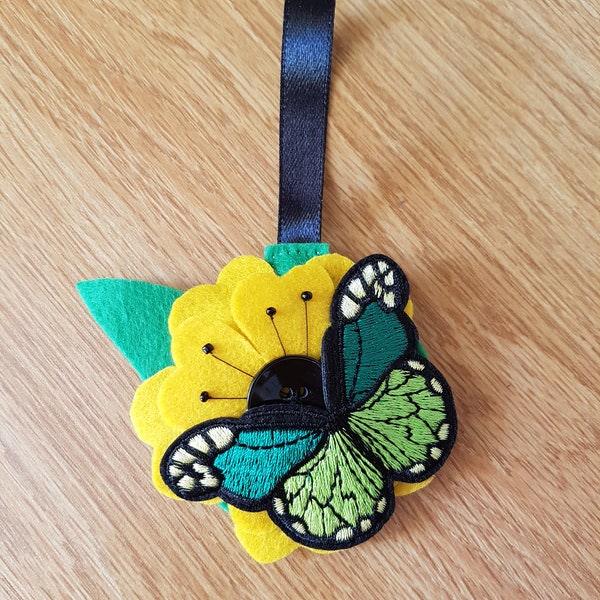 Felt flower and butterfly Christmas bauble in yellow