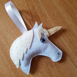 Felt unicorn Christmas bauble in white
