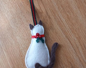 Felt siamese cat with holly bauble