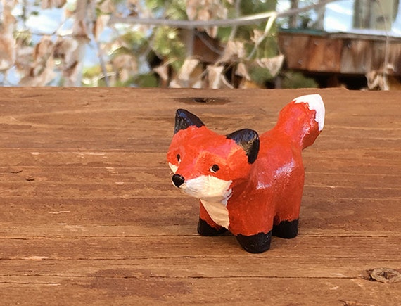 carved wooden fox