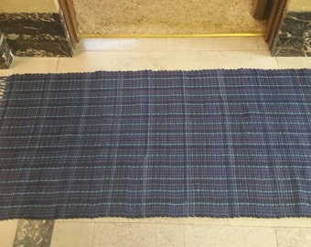 Navy blues rag rug; 27x56 inches; upcycled double knit fabric with new cotton warp
