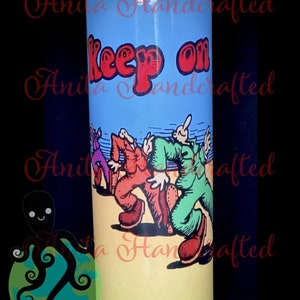 May include: A blue and yellow tumbler with a graphic of four people dancing and the text "Keep on".