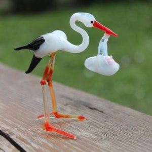 Stork with Baby Bundle Figurine Blown Glass Shower Gift The stork brings the baby Stork with Baby Bundle Sculpture Glass Stork