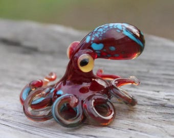 吹きガラスのオレンジと青のタコのガラスの置物タコガラスの海のタコ