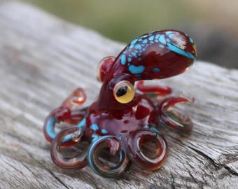 吹きガラスのオレンジと青のタコのガラスの置物タコガラスの海のタコ