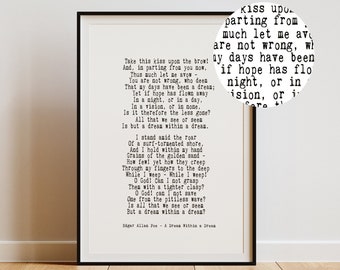 May include: A framed print featuring the poem "A Dream Within a Dream" by Edgar Allan Poe. The black frame surrounds the white paper with black text. The poem's title and author are at the bottom.