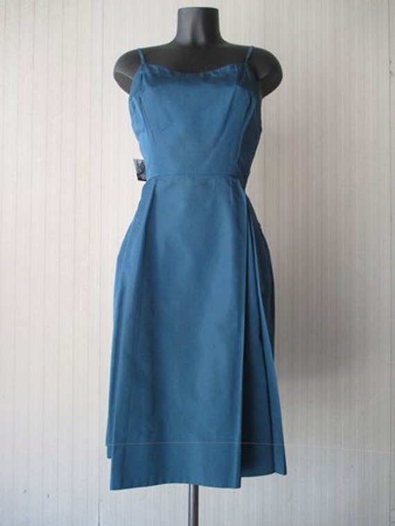 sachin and babi light blue dress Where to Book Your Spray Tan in Birmingham AL main image 0