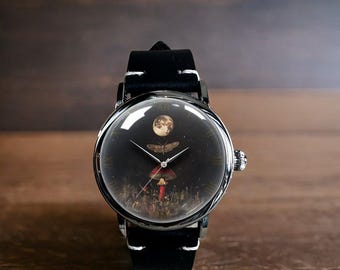 Reloj de pulsera mecánico de cuero con diseño de polilla seta y luna