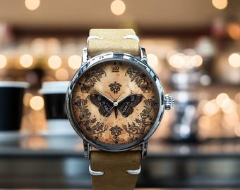 Reloj de pulsera mecánico de cuero con diseño retro de mariposa