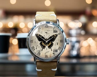 Reloj de pulsera mecánico de cuero con diseño retro de mariposa