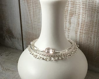 Sterling silver bracelet set with Rose Quartz