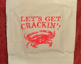 „Let's Get Crackin' Wet Wipes“, das Standarddesign ist auf eine Seite einer feuchten Tücherpackung für Krabbenfutter und Festessen gedruckt, mindestens 25 Packungen