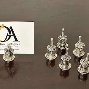 Mooie set van zes witmetalen champagne-emmernaamkaarthouders