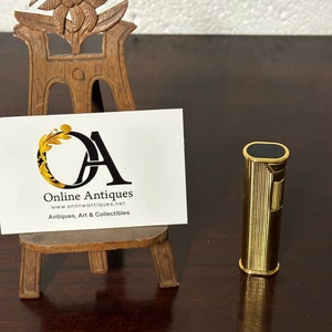 Vintage c1970’s Swiss Made Gold Plated Dunhill Slim Dress Lighter with Black Enamel area to lid