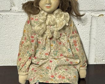 Charming Vintage Porcelain and Fabric Doll with Hand Painted Face and Floral Outfit
