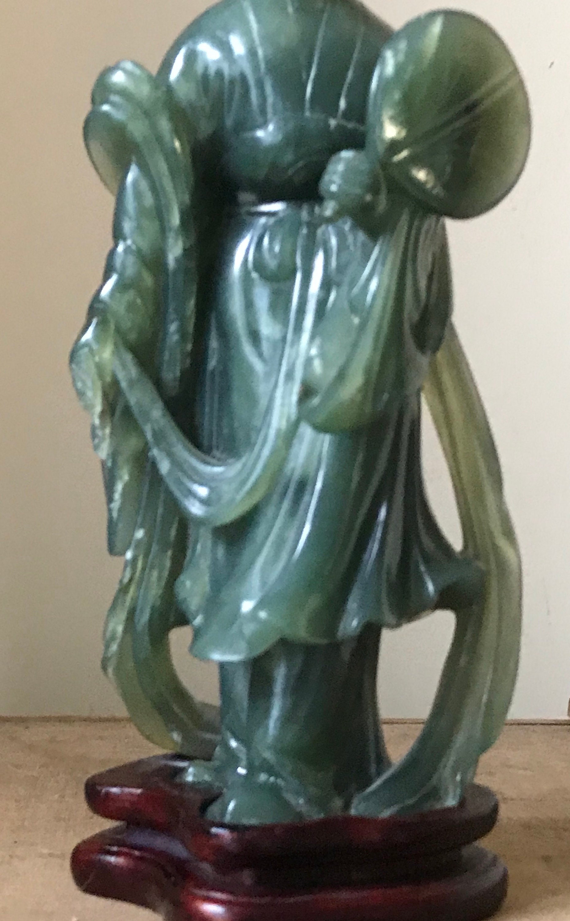 Antique Chinese Carved Green Jade Figurine Of A Tang Lady mounted on a wooden plinth