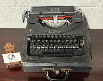 Vintage Circa 1950’s Oliver Portable Typewriter With Case