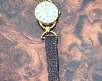 Vintage Gucci 18K yellow gold 10 Micron plated Gucci 6000L Watch
