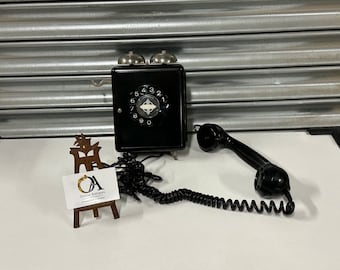 A 1950's Swiss Weidmann Bakelite Wall Mounted Telephone